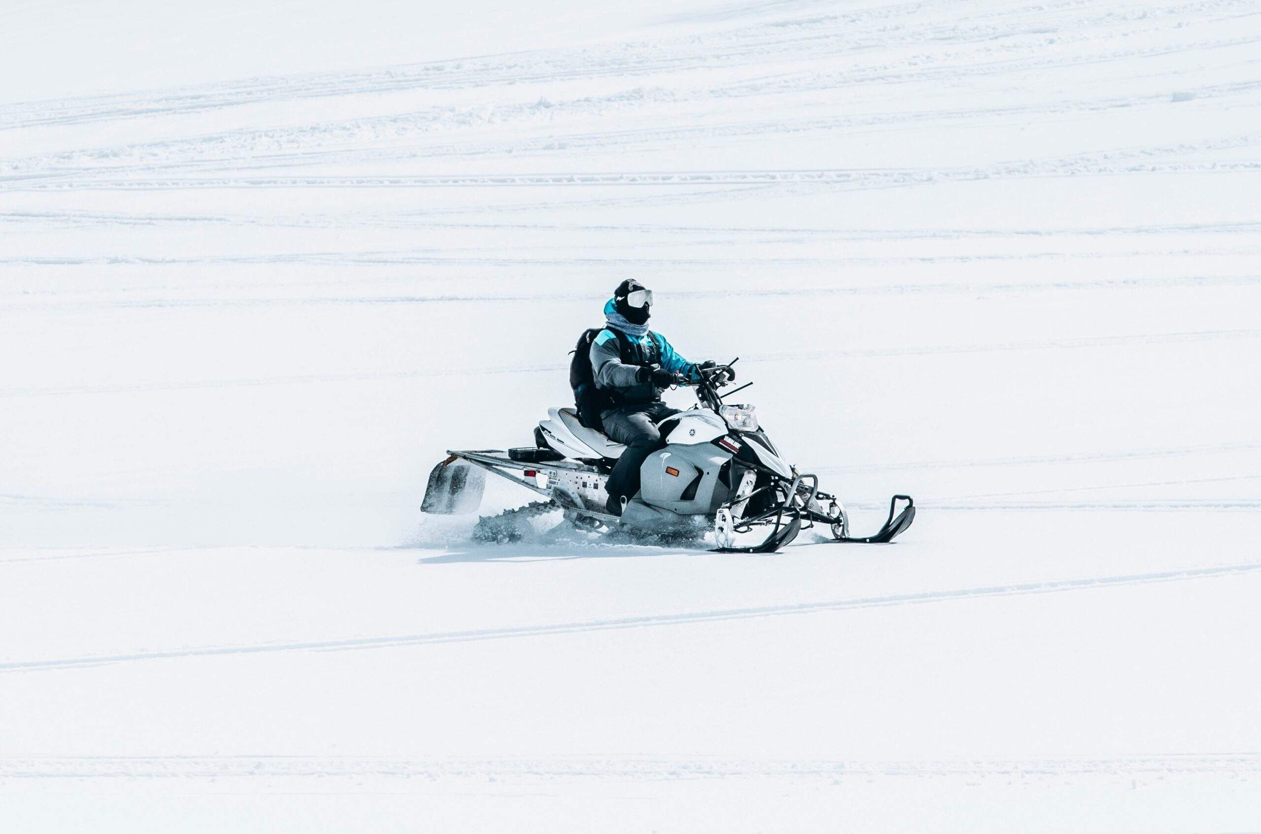 snowmobile in snowy mountains
