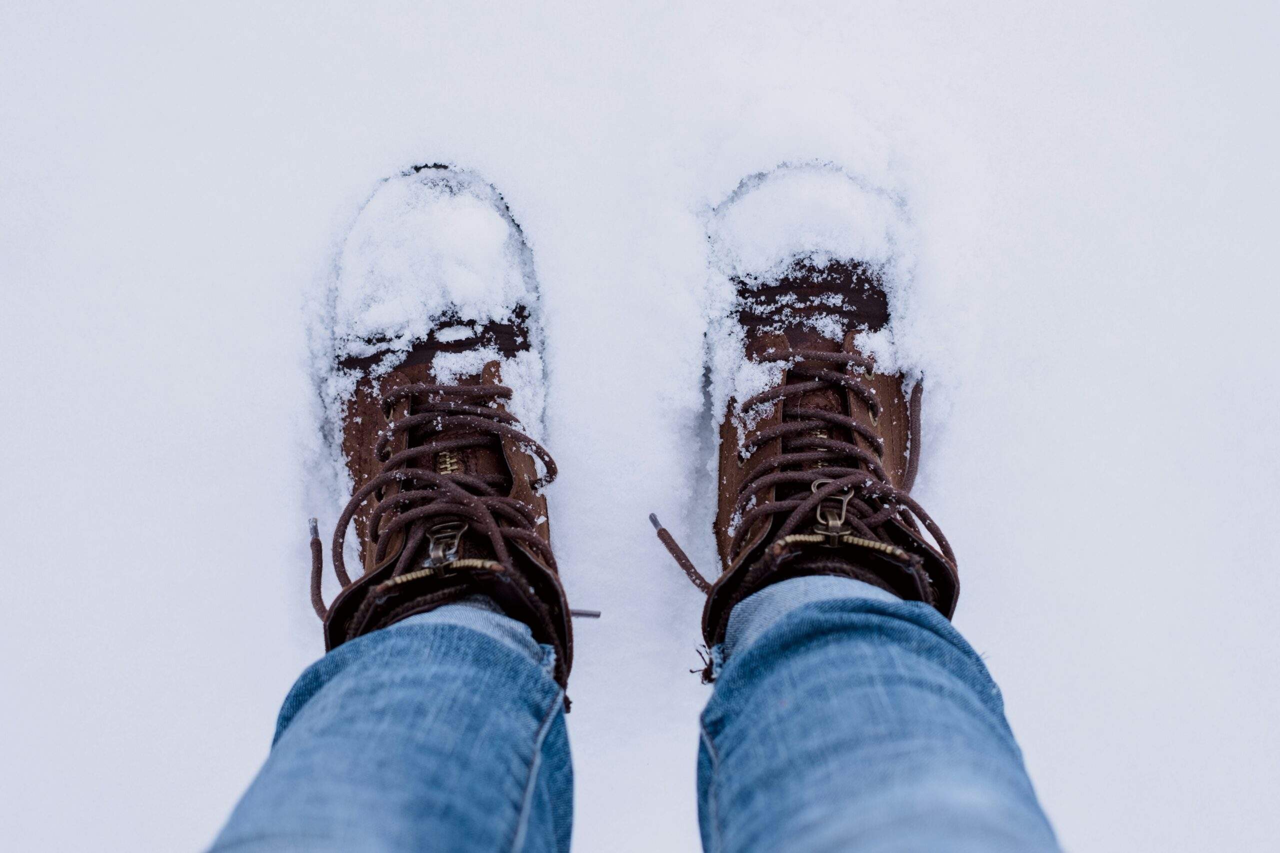 A comparison image showing flimsy budget snowshoes versus premium high-performance ones