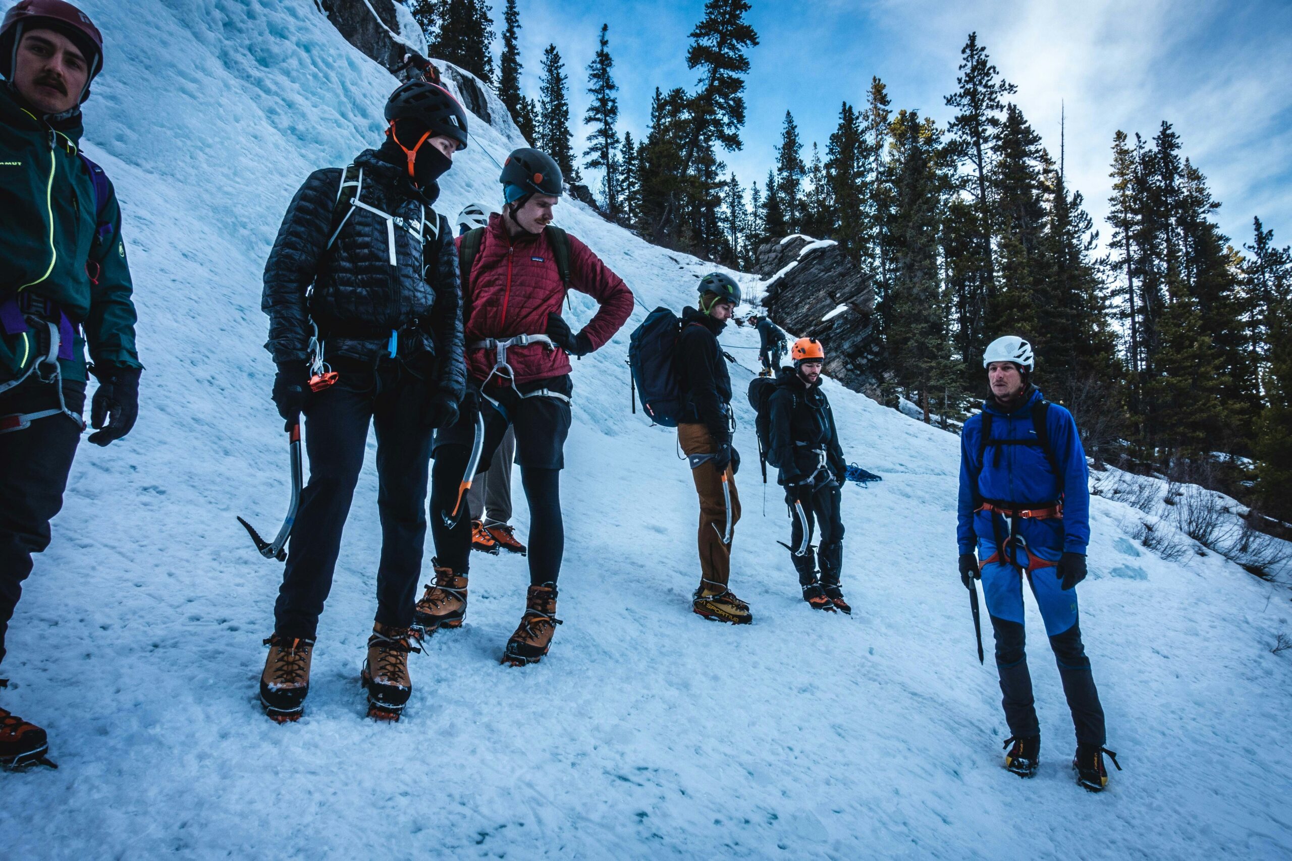 Person slipping on icy trail while attempting snowshoeing
