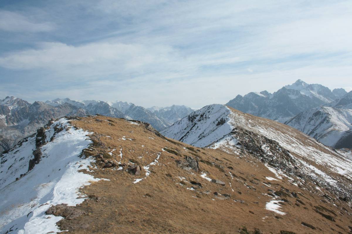 Essential gear laid out for a successful snowshoe action trip